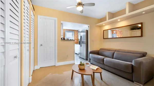a living room with furniture and a table