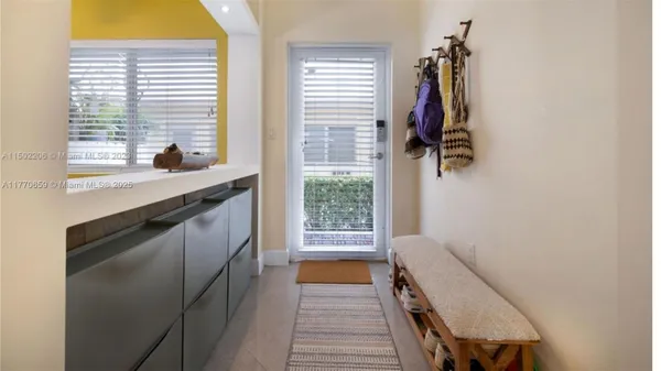 a hallway with a large window