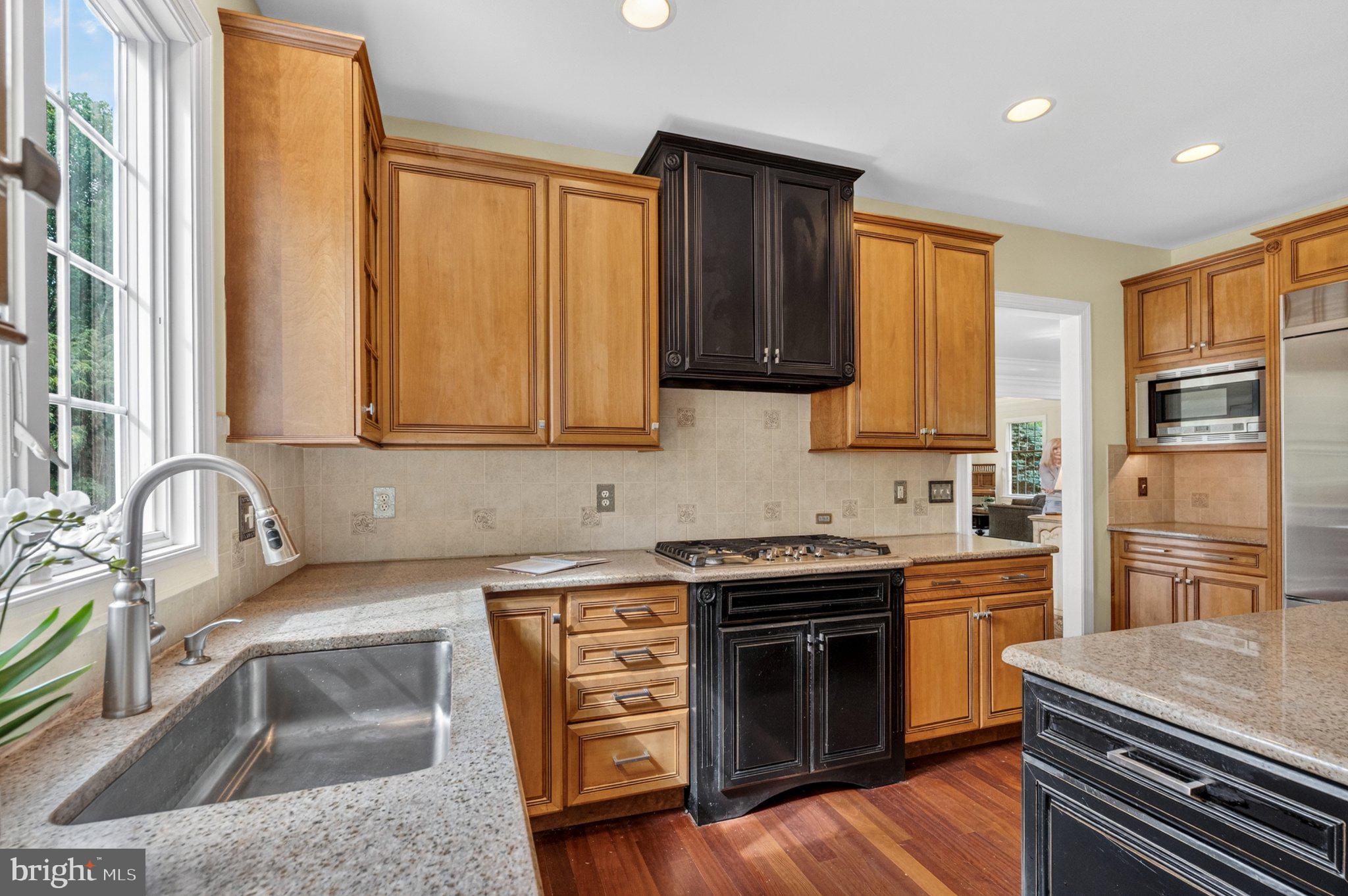 342 Ring Road Chadds Ford, PA 19317 - Photo 26 of 95 Warm wood tones in a stylish kitchen.
