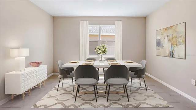 a dining room with furniture and window