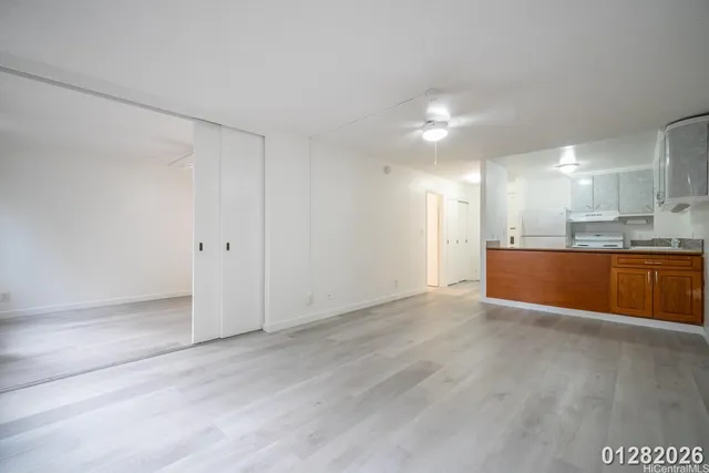 a view of kitchen with wooden floor