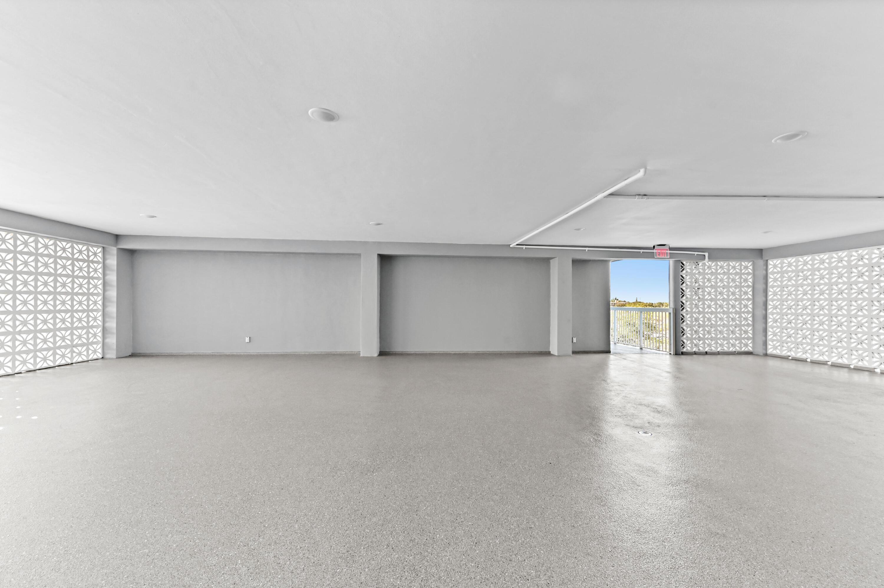 5700 Northwest 2nd Avenue, Unit 503 Boca Raton, FL 33487 - Photo 33 of 40 an empty room with windows and closet