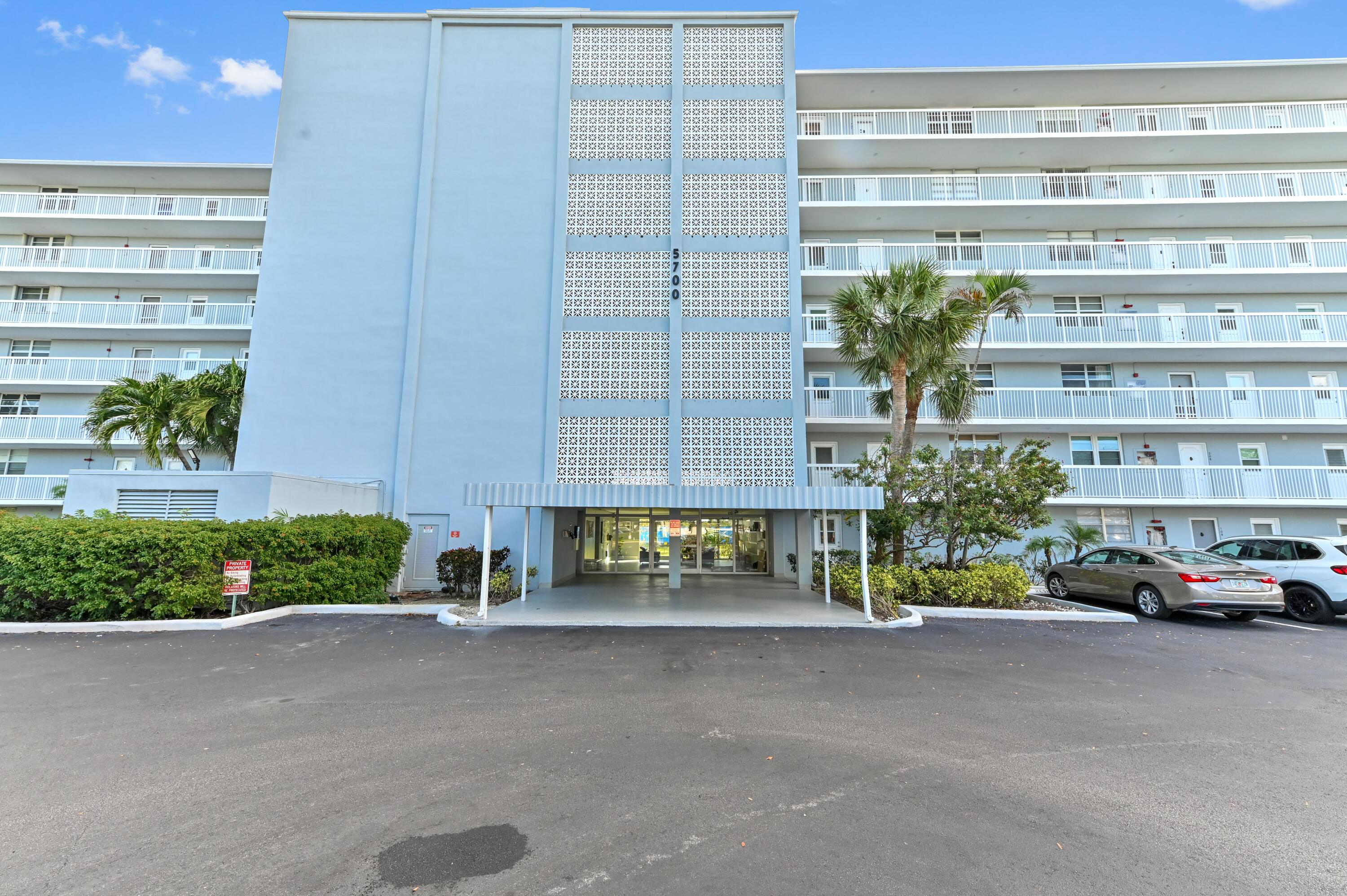 5700 Northwest 2nd Avenue, Unit 503 Boca Raton, FL 33487 - Photo 36 of 40 a car parked in front of a building