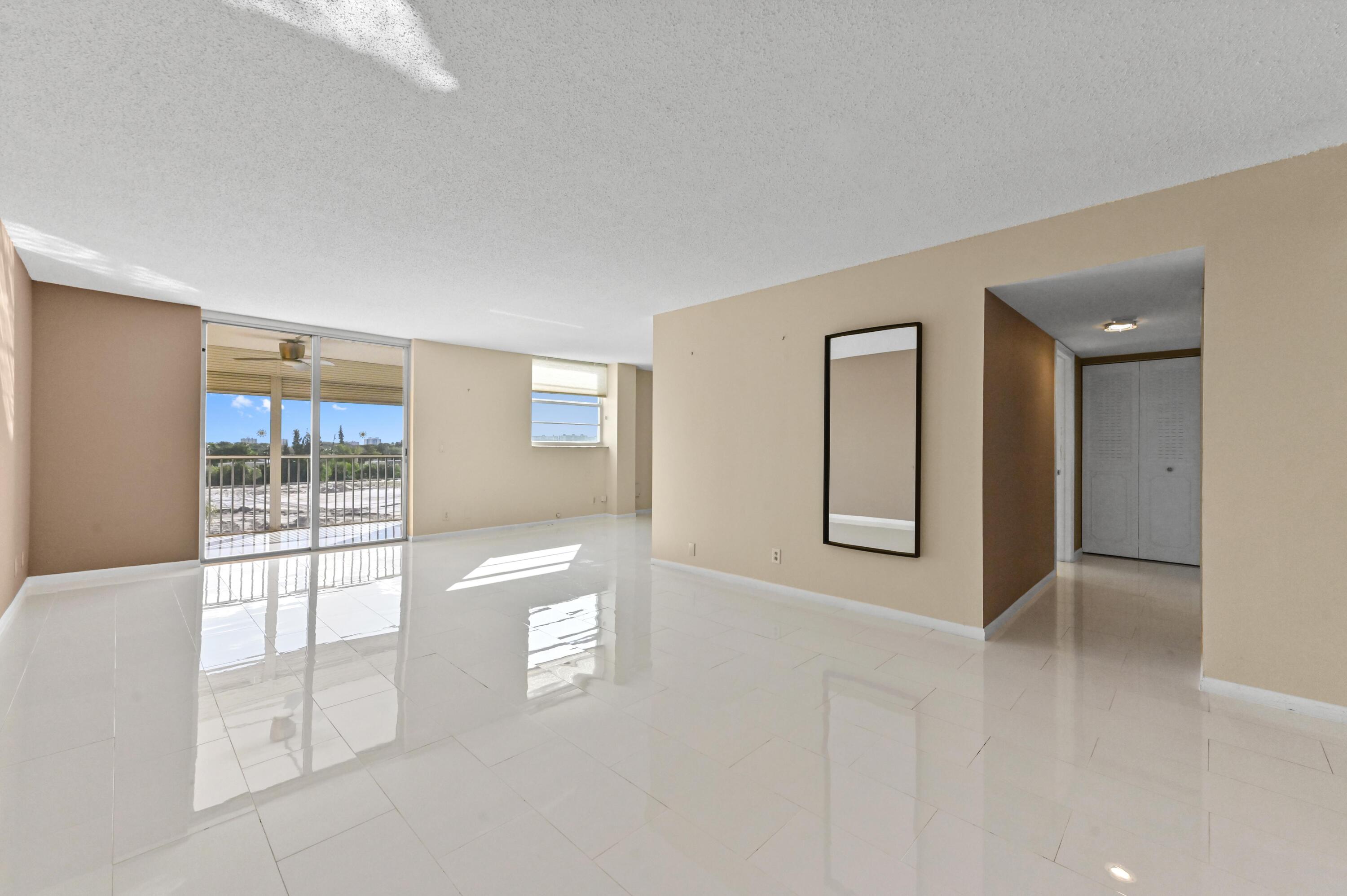 5700 Northwest 2nd Avenue, Unit 503 Boca Raton, FL 33487 - Photo 5 of 40 a view of livingroom with window