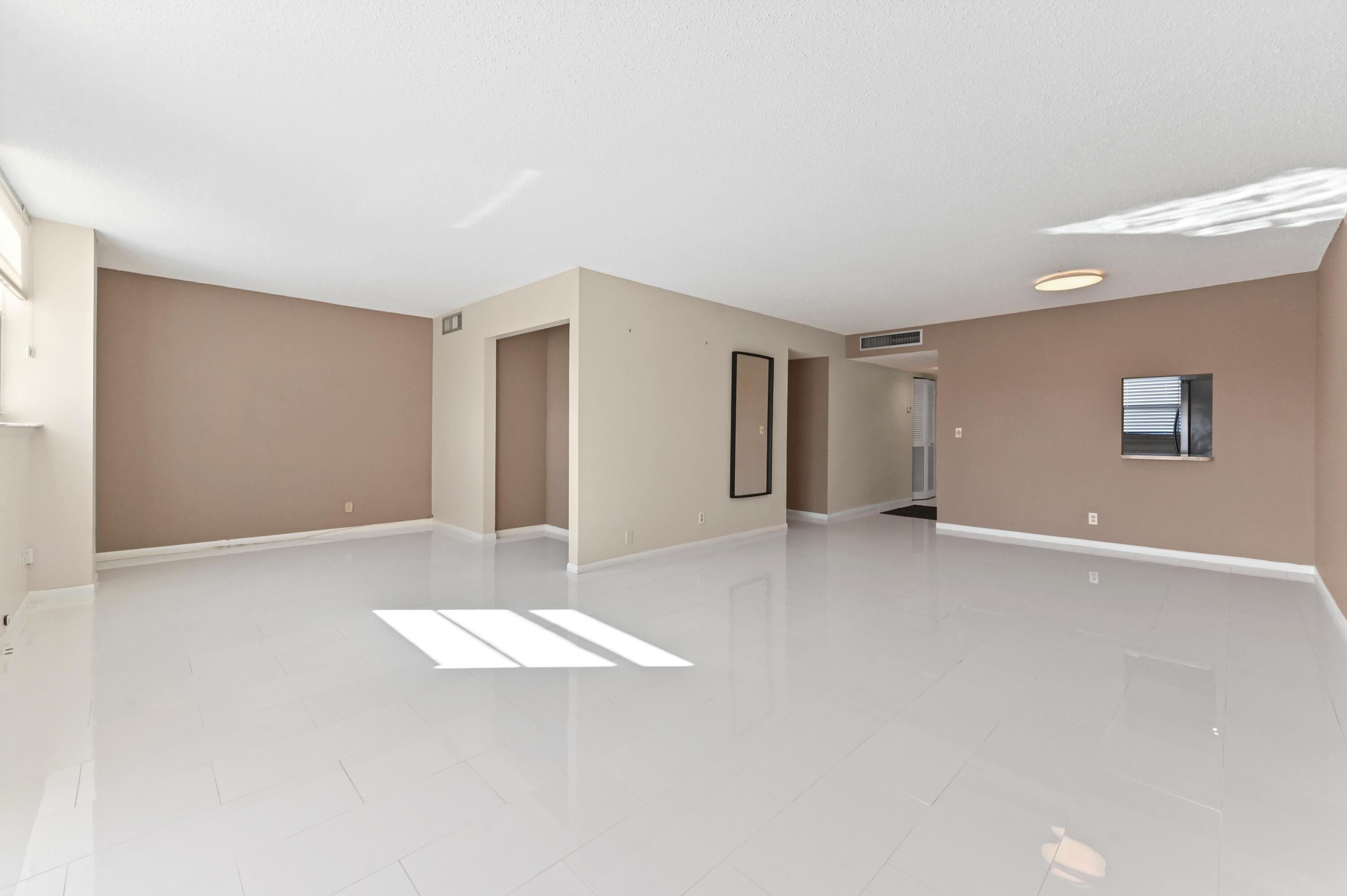 5700 Northwest 2nd Avenue, Unit 503 Boca Raton, FL 33487 - Photo 8 of 40 a view of a livingroom with an empty space