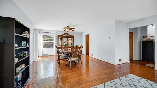 a view of a livingroom with furniture and wooden floor