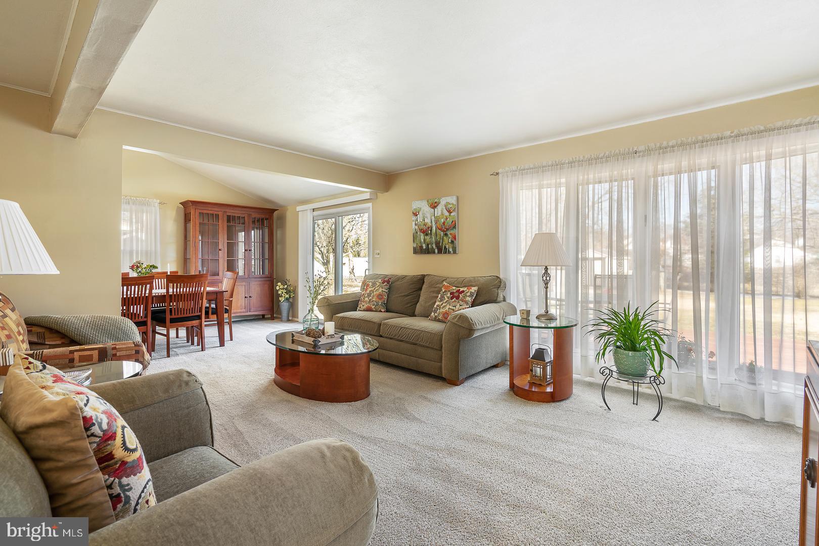 26 Endicott Road Hamilton, NJ 08690 - Photo 3 of 28 a living room with furniture and a large window