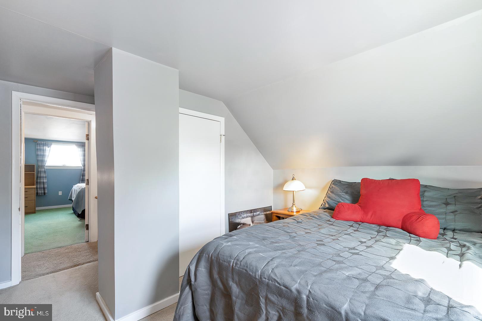 26 Endicott Road Hamilton, NJ 08690 - Photo 22 of 28 a bedroom with a bed and a view of living room