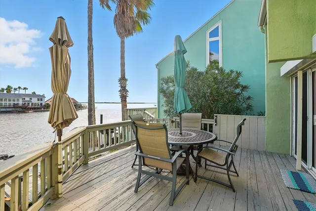 a view of a chairs on the deck