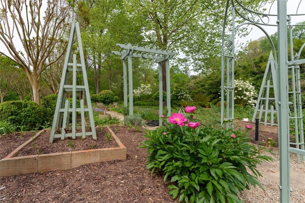 2288 Peachtree Road Northwest, Unit 4 Atlanta, GA 30309 - Photo 44 of 50 a view of a bench in a garden