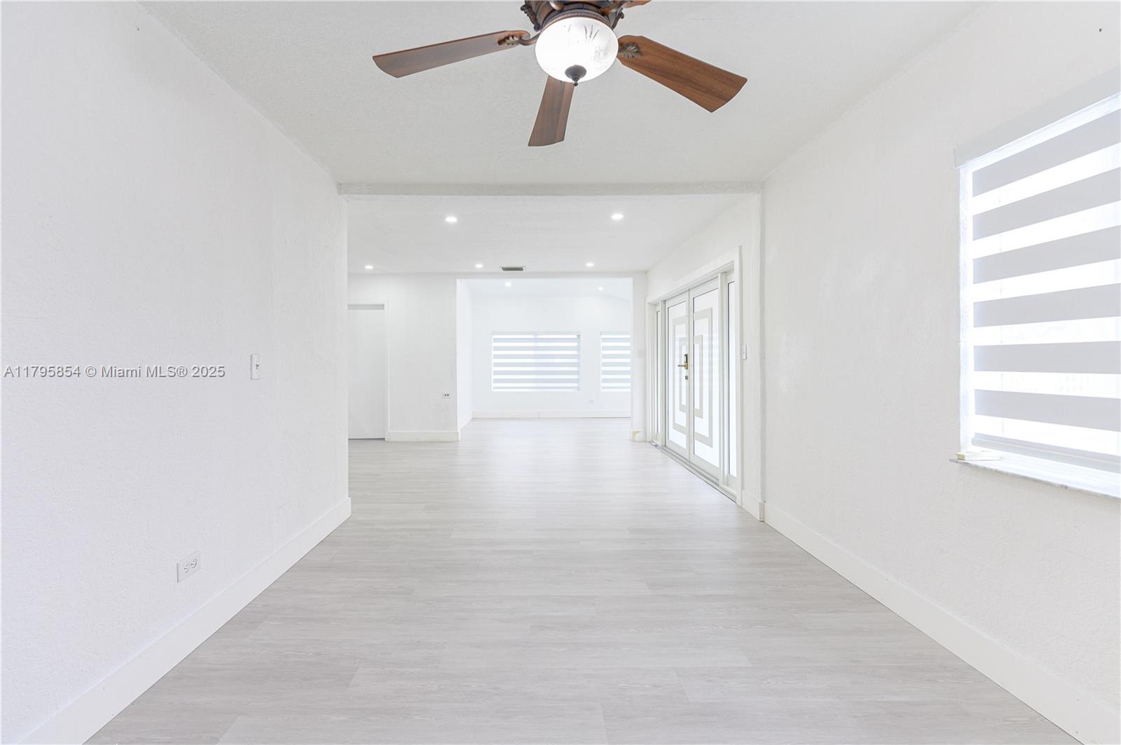 5200 Southwest 4th Street Miami, FL 33134 - Photo 12 of 35 a view of an empty room with a window