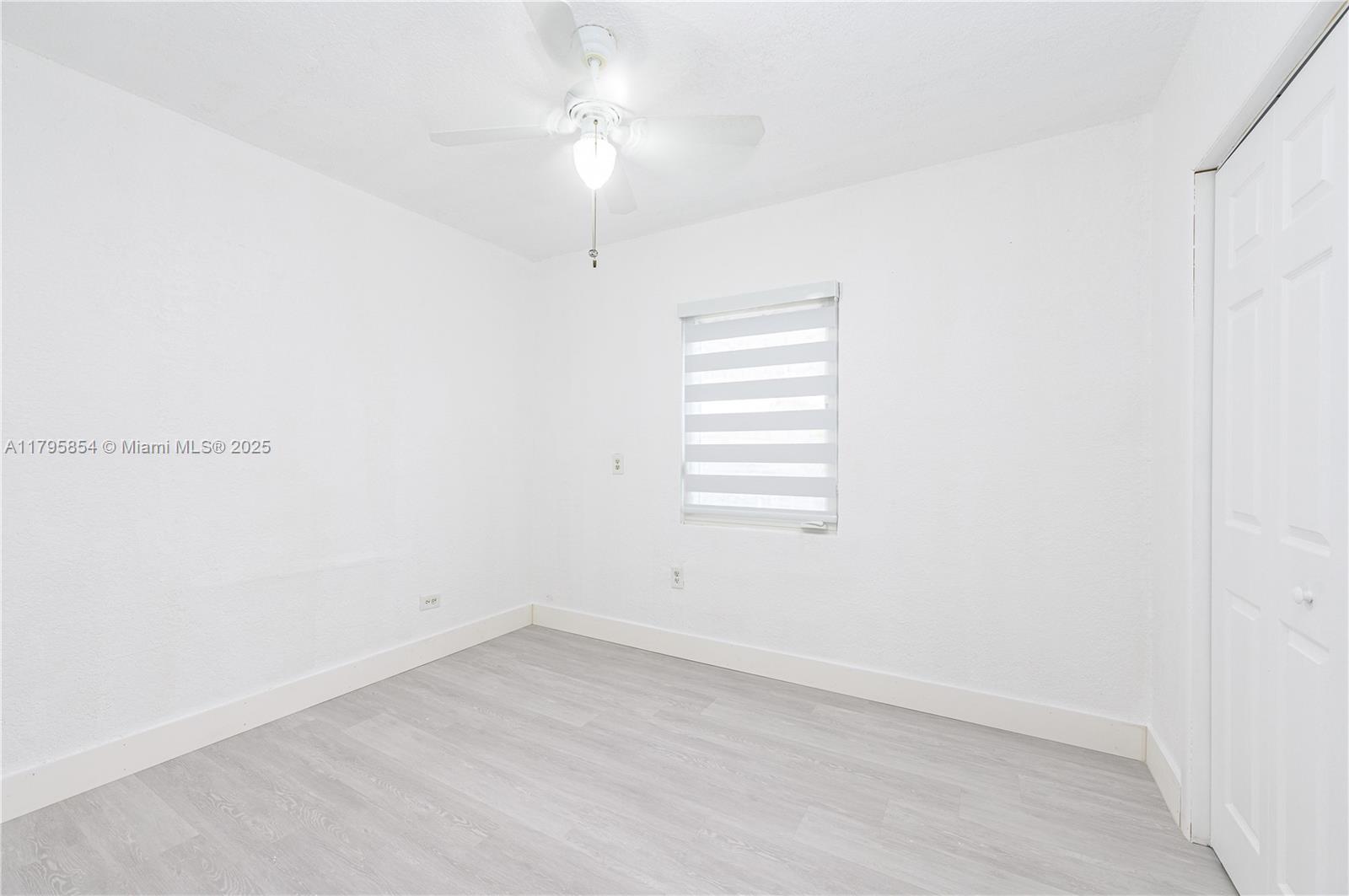 5200 Southwest 4th Street Miami, FL 33134 - Photo 23 of 35 an empty room with a window
