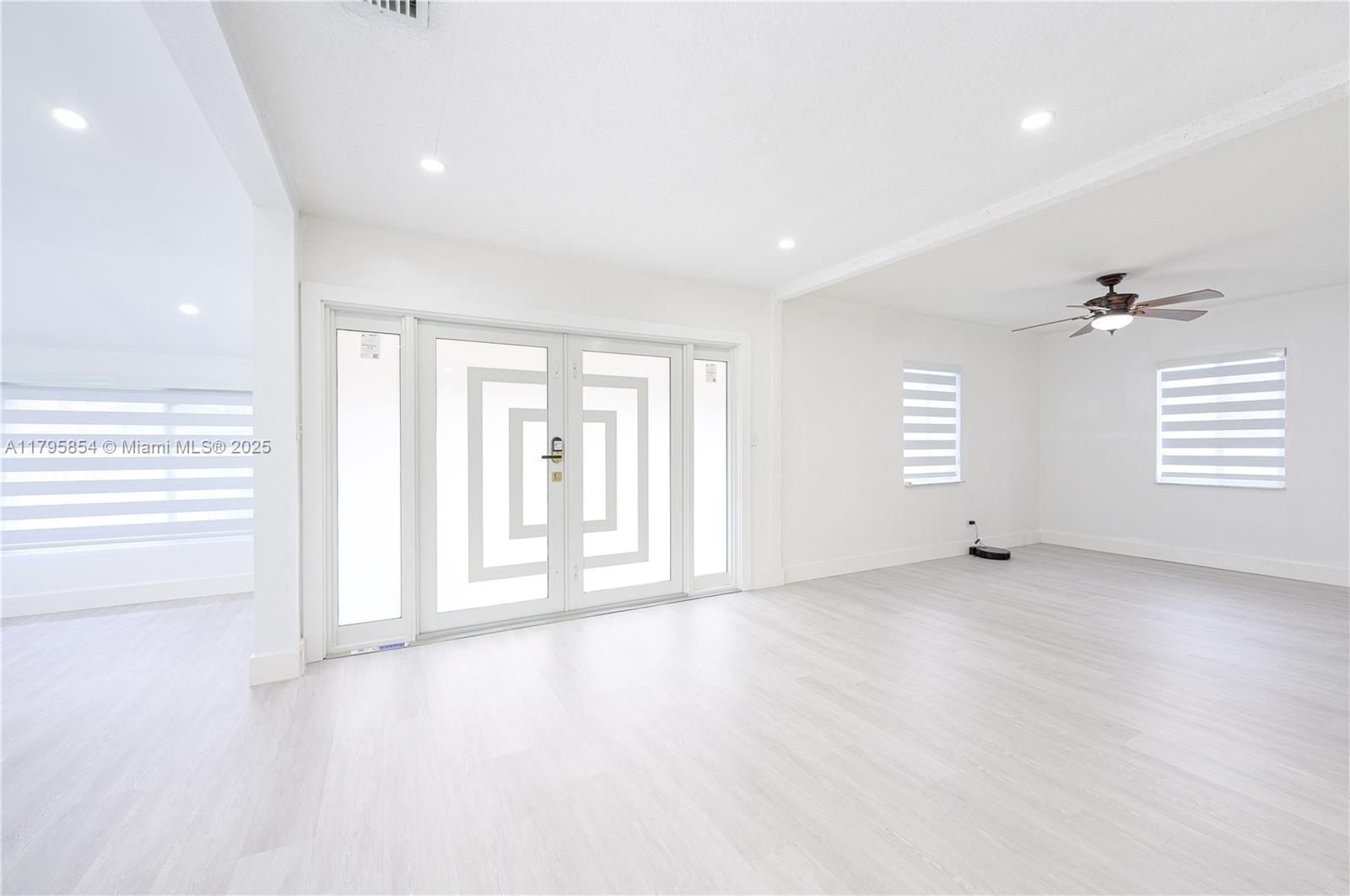 5200 Southwest 4th Street Miami, FL 33134 - Photo 9 of 35 an empty room with windows and closet