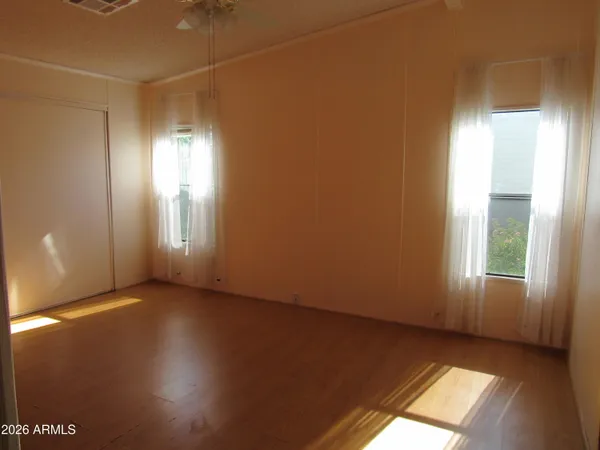 an empty room with windows