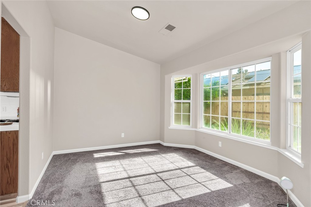 3546 Joerg Avenue Merced, CA 95340 - Photo 18 of 51 an empty room with windows