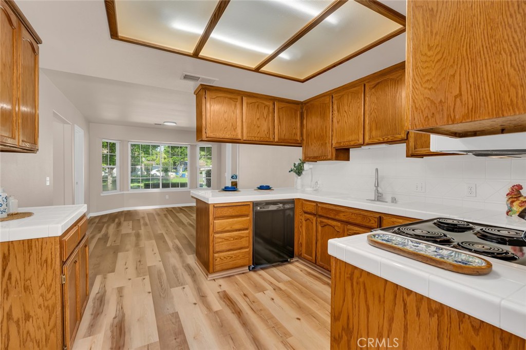 3546 Joerg Avenue Merced, CA 95340 - Photo 20 of 51 a kitchen that has a sink and a stove