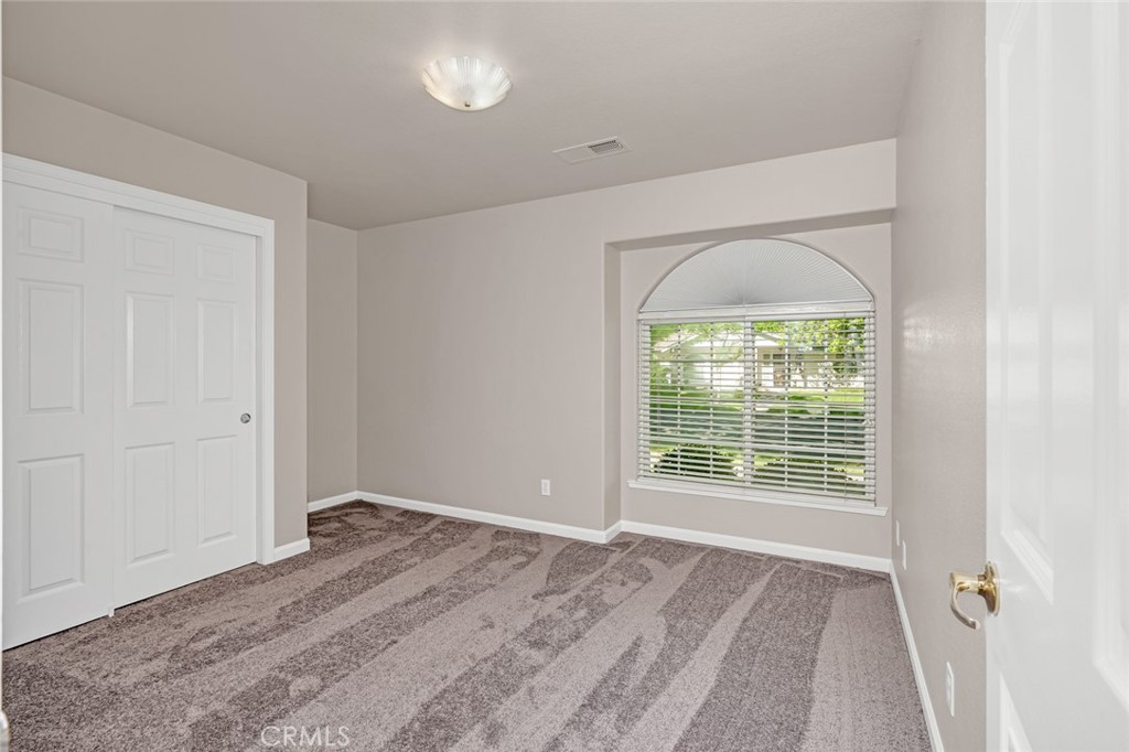 3546 Joerg Avenue Merced, CA 95340 - Photo 40 of 51 a view of an empty room with a window