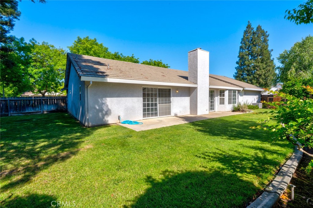 3546 Joerg Avenue Merced, CA 95340 - Photo 45 of 51 a front view of house with yard and green space