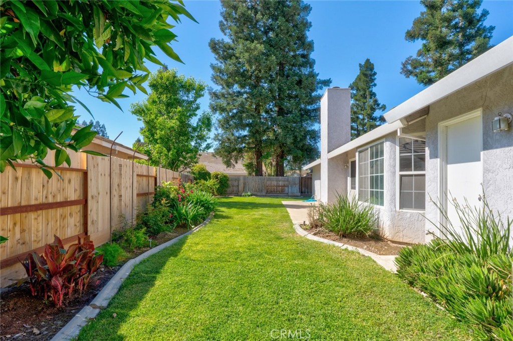 3546 Joerg Avenue Merced, CA 95340 - Photo 46 of 51 a view of a house with backyard and a garden