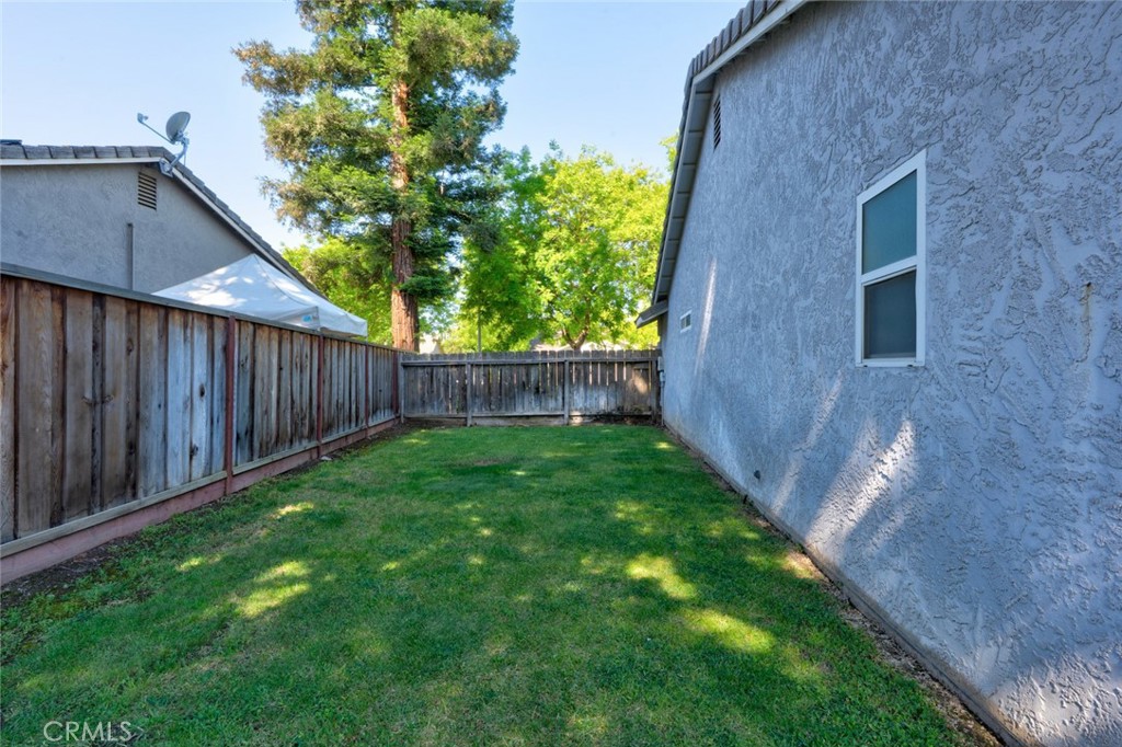 3546 Joerg Avenue Merced, CA 95340 - Photo 50 of 51 a backyard of a house with lots of green space