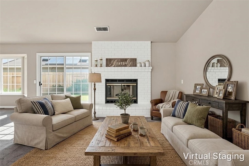 3546 Joerg Avenue Merced, CA 95340 - Photo 10 of 51 a living room with furniture or fireplace and a large window