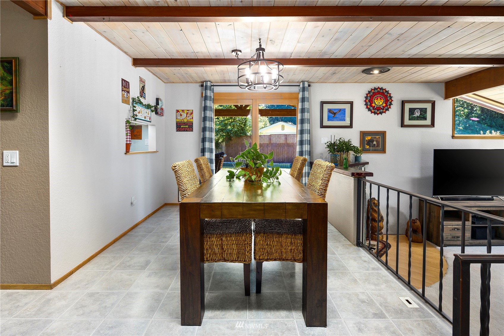 11715 Ingraham Road Snohomish, WA 98290 - Photo 14 of 38 a view of a dining room with furniture window and wooden floor