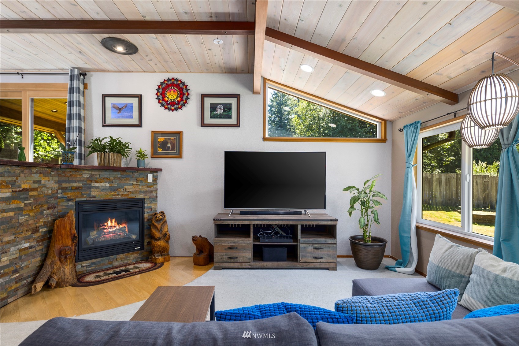 11715 Ingraham Road Snohomish, WA 98290 - Photo 4 of 38 a living room with furniture and a flat screen tv