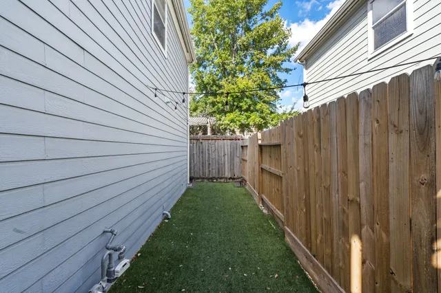a backyard of a house with lots of green space