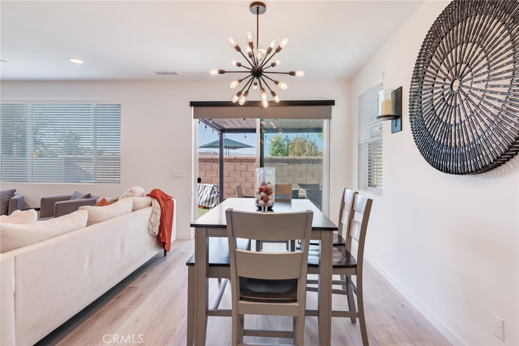 4247 Bravado Court Riverside, CA 92505 - Photo 11 of 33 a view of a dining room with furniture window and outside view
