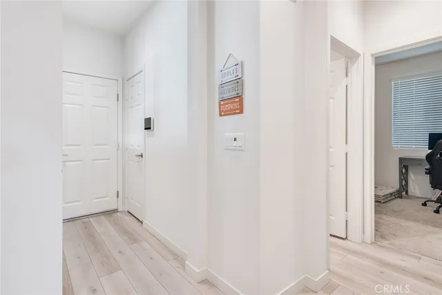 a view of a bedroom from the hallway