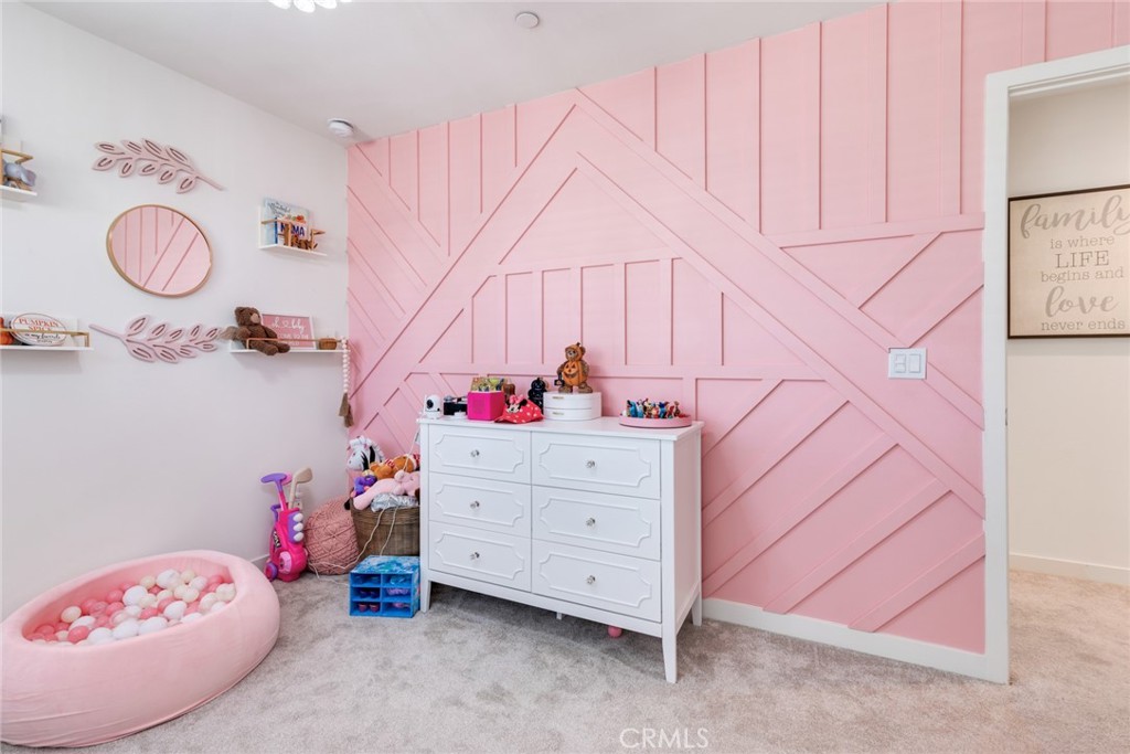 4247 Bravado Court Riverside, CA 92505 - Photo 19 of 33 a bedroom with a bed and a window