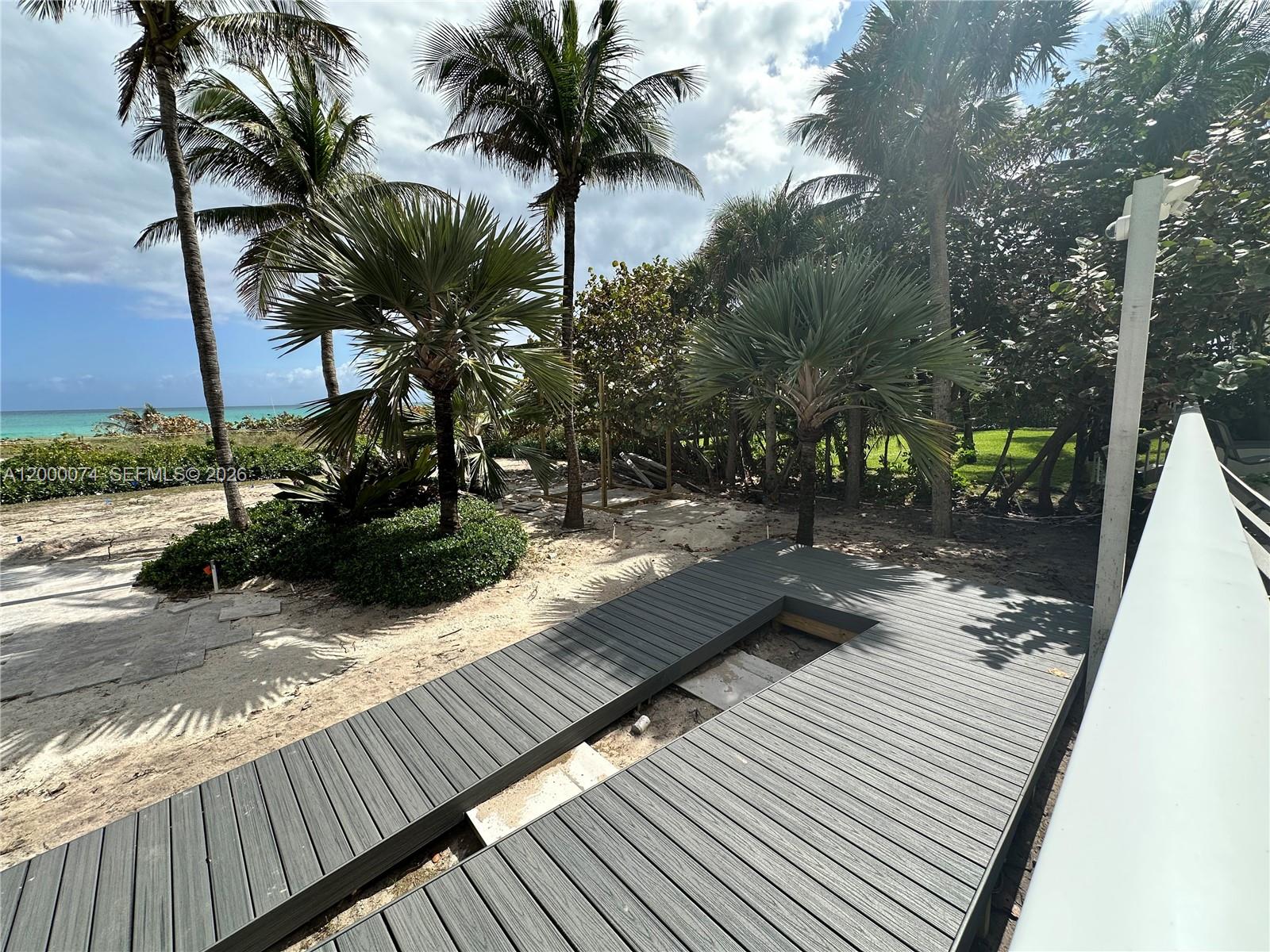 8925 Collins Avenue, Unit 2J Surfside, FL 33154 - Photo 47 of 63 a view of a wooden floor with a yard