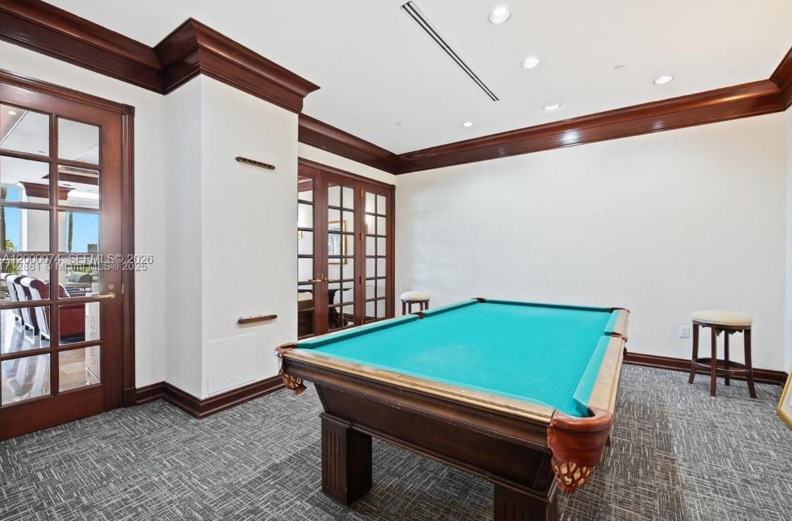 8925 Collins Avenue, Unit 2J Surfside, FL 33154 - Photo 63 of 63 a room with pool table and windows