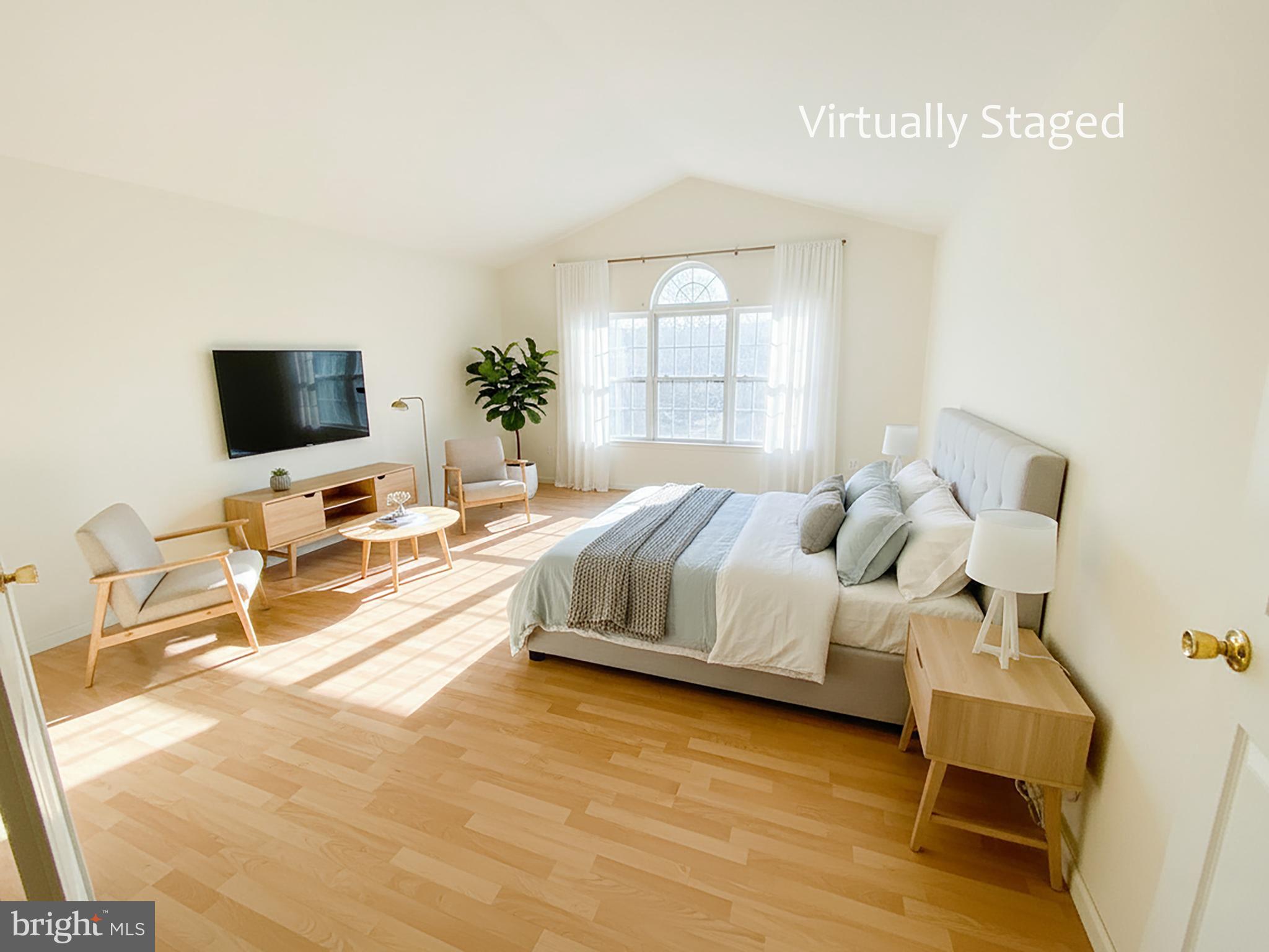 39 Tynemouth Drive Lumberton, NJ 08048 - Photo 4 of 22 a spacious bedroom with a bed and a flat screen tv