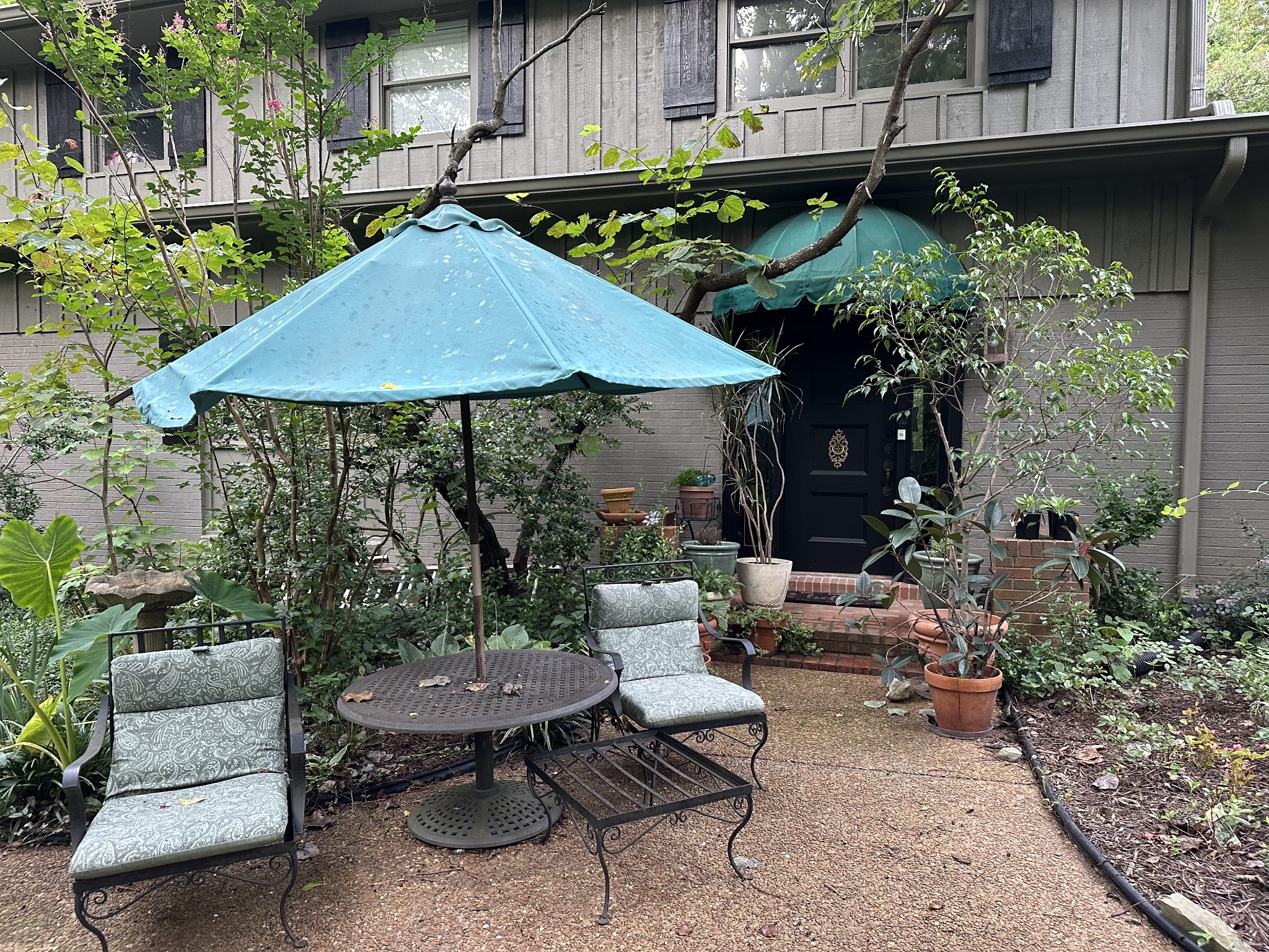 2004 Otter Creek Road Nashville, TN 37215 - Photo 20 of 21 a backyard of a house with a yard and outdoor seating