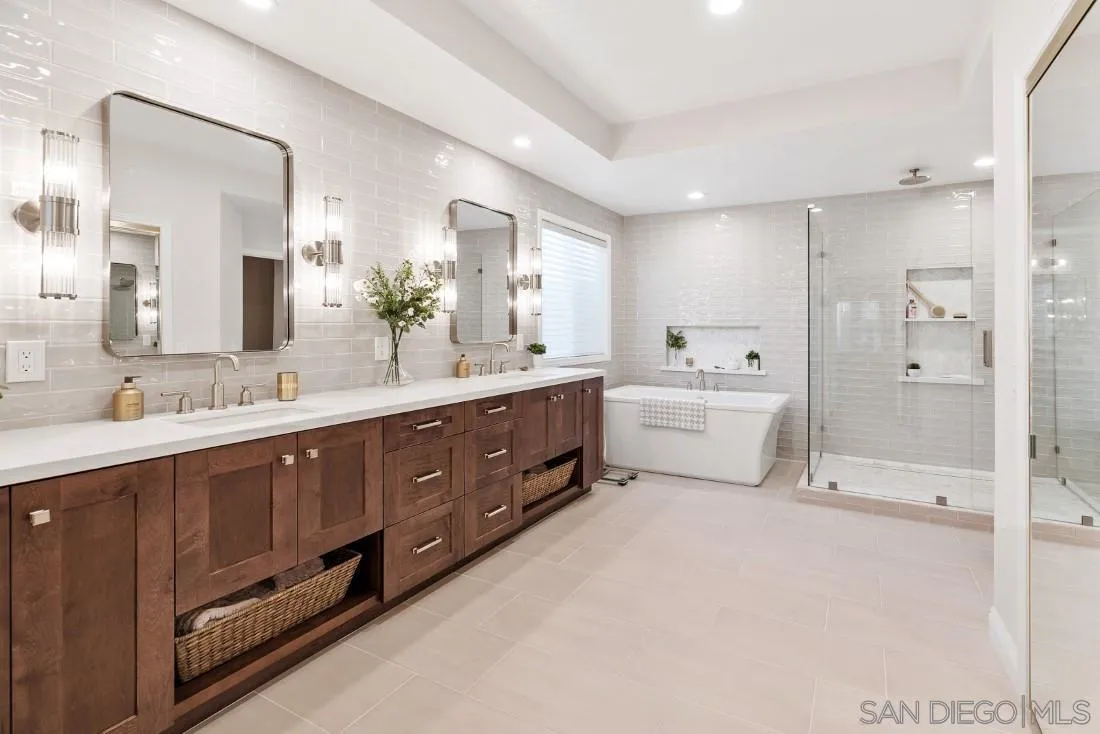12904 Stone Canyon Road Poway, CA 92064 - Photo 19 of 72 a spacious bathroom with a double vanity sink mirror double and shower