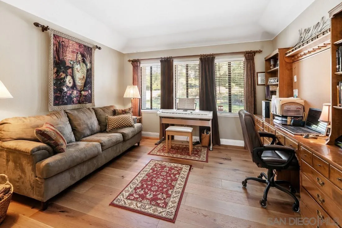12904 Stone Canyon Road Poway, CA 92064 - Photo 23 of 72 a living room with furniture and a window