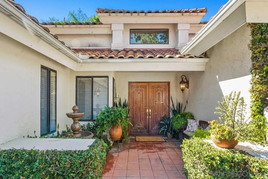 12904 Stone Canyon Road Poway, CA 92064 - Photo 3 of 72 front view of a house with a small yard