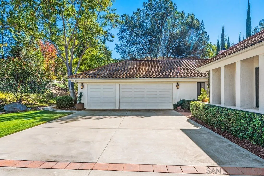 12904 Stone Canyon Road Poway, CA 92064 - Photo 4 of 72 a view of backyard of house and trees