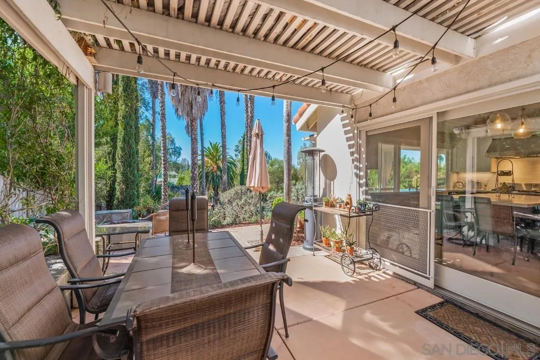 12904 Stone Canyon Road Poway, CA 92064 - Photo 52 of 72 a view of living room with patio furniture and floor to ceiling windows