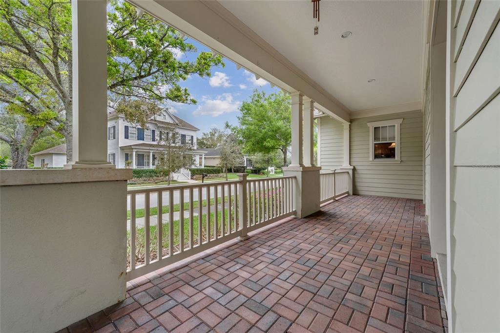 1027 Juel Street Orlando, FL 32814 - Photo 11 of 78 a view of a balcony with wooden floor