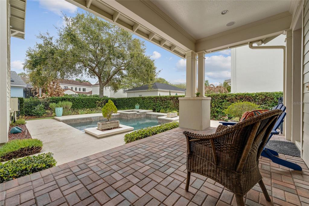 1027 Juel Street Orlando, FL 32814 - Photo 67 of 78 a view of a patio with a table chairs and backyard
