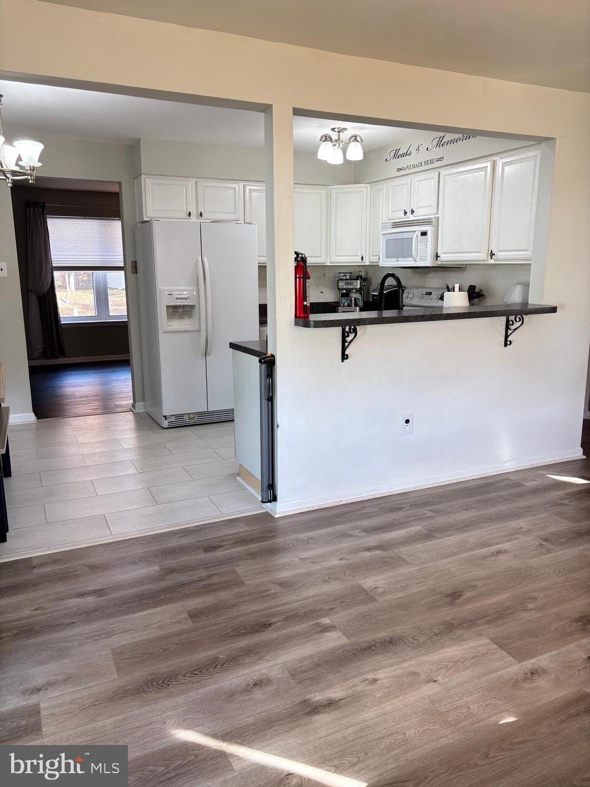 1011 South Beecham Road Williamstown, NJ 08094 - Photo 12 of 23 a view of kitchen with stainless steel appliances granite countertop a refrigerator a stove and a sink
