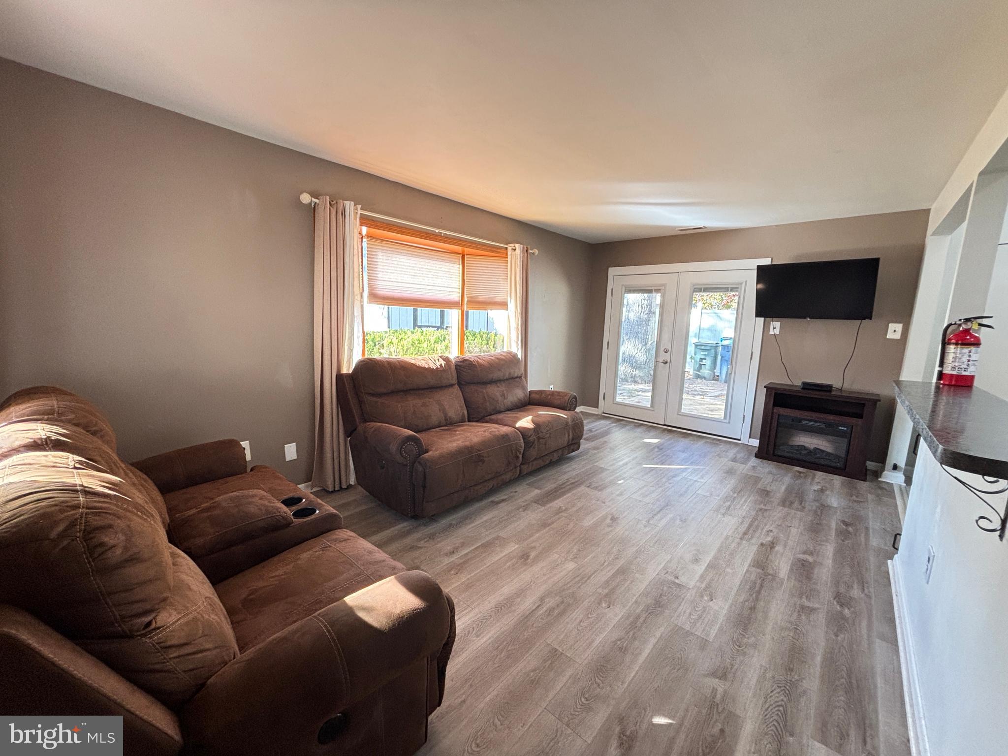 1011 South Beecham Road Williamstown, NJ 08094 - Photo 14 of 23 a living room with furniture and a flat screen tv