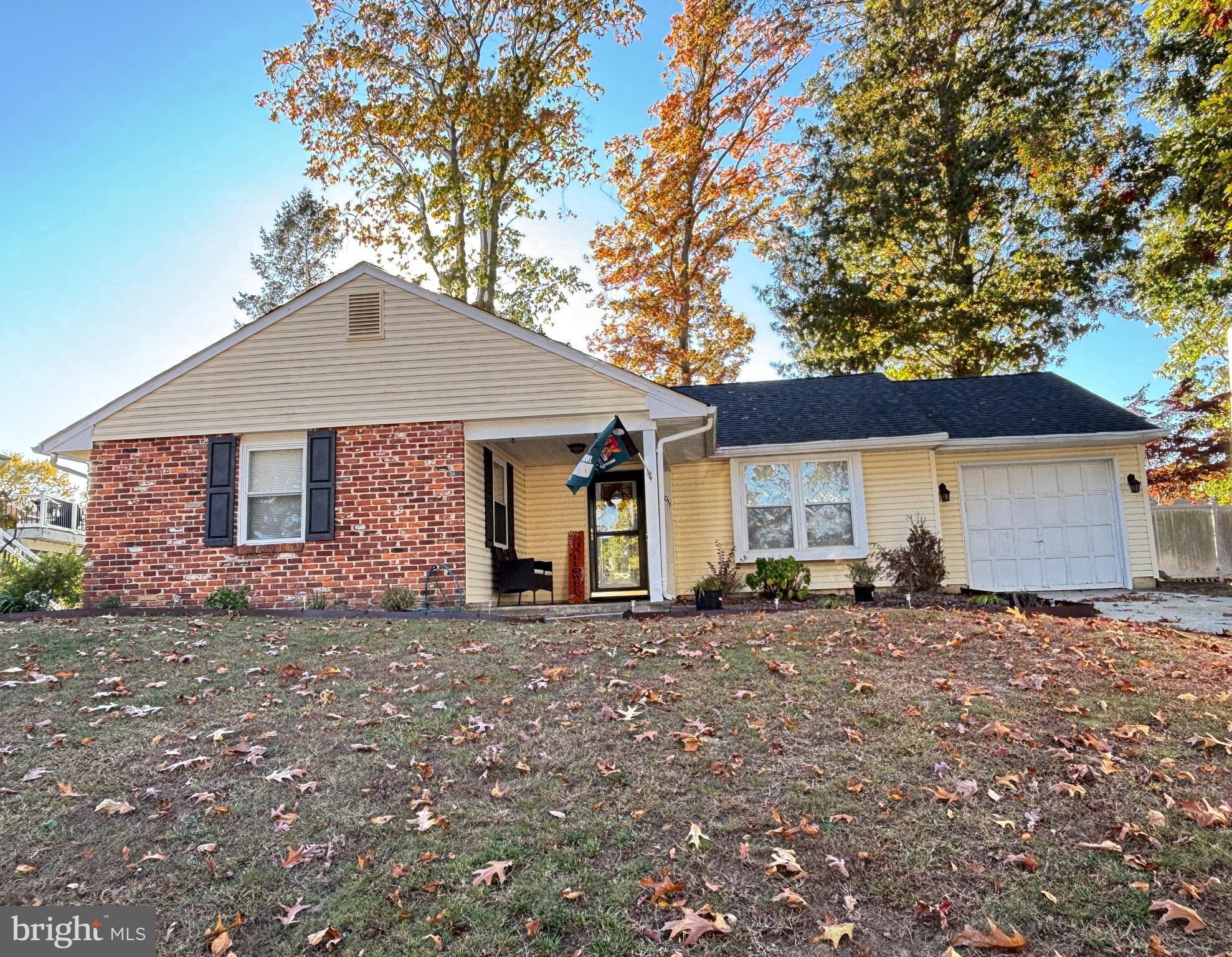 1011 South Beecham Road Williamstown, NJ 08094 - Photo 2 of 23 a house with lots of trees