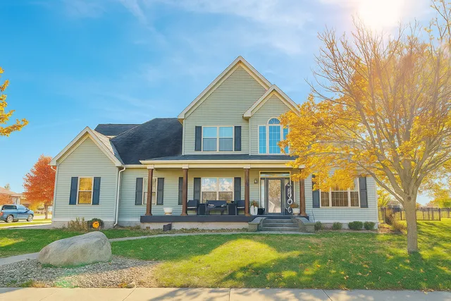 a front view of a building with garden