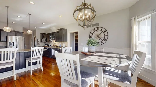 a workspace with lounge chair and a window