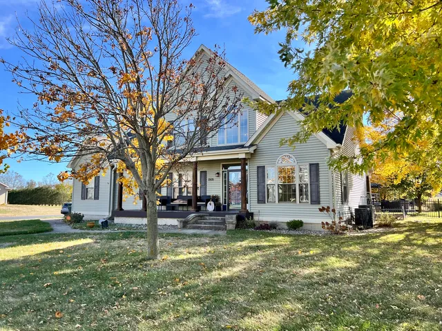 a front view of a building with garden