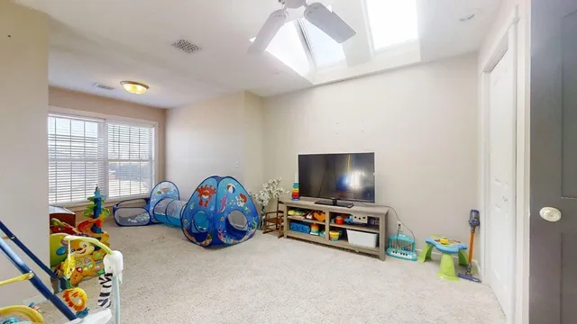 a view of a chairs and table in the patio