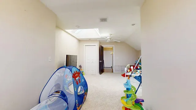 a view of a swimming pool with outdoor seating